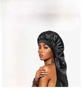 Detailed view of long satin sleep caps in multiple colors for hair protection and comfort