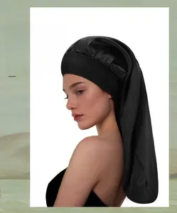 Detail of black satin wide-brim long sleep bonnet for long hair protection and hair care