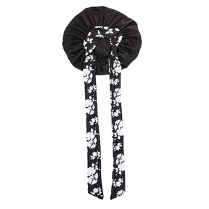 Black satin sleep bonnet with long black and white floral printed ribbon tie bands