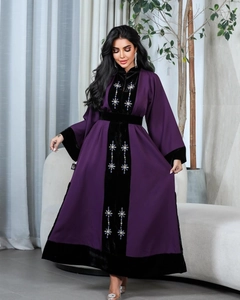 Detailed view of floral crystal bead embroidery on purple velvet patchwork robe