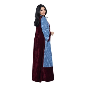 Detail of velvet patchwork robe showing wine red and light blue pleated fabric contrast