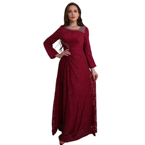 Detailed view of dark red lace maxi dress with silver rhinestone embellishments