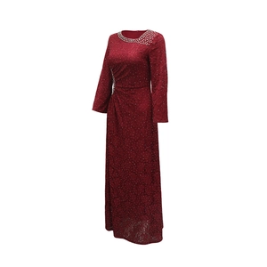Detail of burgundy lace dress with sparkling rhinestones and slim waist pleats