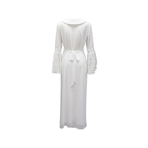 Detail view of white robe back with floral lace patchwork sleeves and waist tie