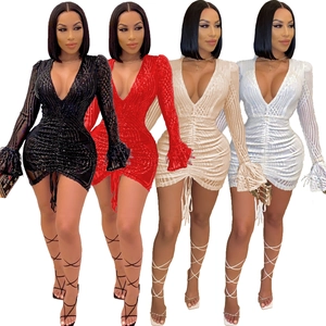 Deep V-neck sequined mini dress with feather cuffs shown in black red gold and white