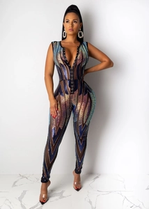 Detail of high-waist sequin jumpsuit with deep V-neck and sheer mesh fabric