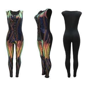 Detail of high-waisted sequin jumpsuit with colorful gradient sequins and front hook-and-eye closure