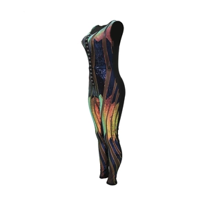 Detailed view of the gradient sequin fabric and lace-up front on this chic jumpsuit