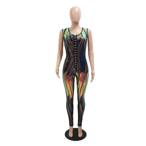 Detail of colorful sequined fabric on a high-waisted sleeveless party jumpsuit