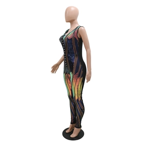 Detail view of colorful sequin fabric jumpsuit with side lace-up and high waist design