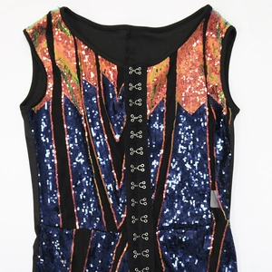Detail of sequin jumpsuit with colorful V-shape geometric patterns and hook-and-eye closure