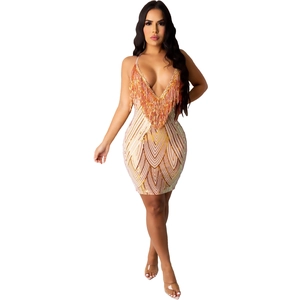 Sparkly sequin mini dress with gold fringe tassels and geometric patterns for parties