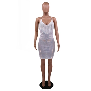 Detail of white sequin fringe dress with deep V-neck and geometric wave patterns