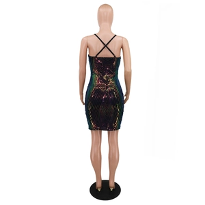 Close-up of sequin tassel dress featuring colorful sequins and crisscross back straps