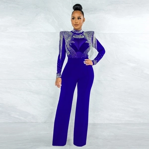 Combinaison bleu roi à jambes larges avec pompons strass et épaules en mesh transparent
