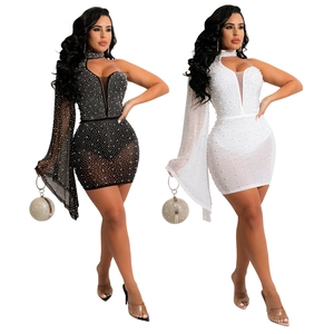 Detail of sequined bodycon party dress with cut-out neckline and flared sleeve