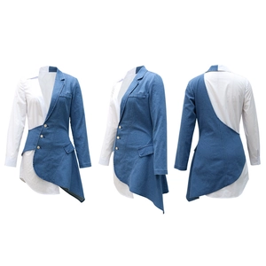 Detail of deconstructed blazer featuring denim patchwork and irregular white shirt hemline