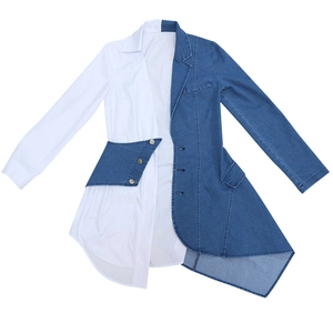Detail of asymmetrical patchwork denim and white shirt dress with V-neckline and buttons