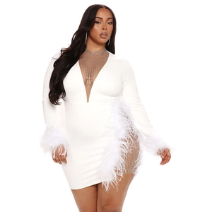 White mini dress with deep V-neck, rhinestone mesh detail and feather trim cuffs