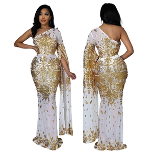 Elegant one-shoulder white tulle gown featuring ornate gold sequin baroque embroidery