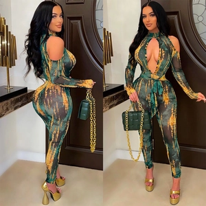 Sheer tie-dye jumpsuit with cut-out detail and cold-shoulder design in green and yellow