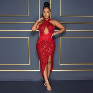 Detailed view of red sequin dress with cross neck, sexy cutout, and sheer mesh waist insert