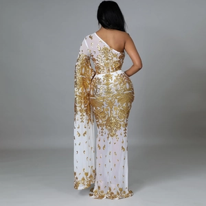 Detailed back view of luxury white and gold sequined one-shoulder evening gown