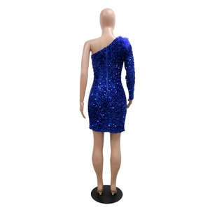 Rear view of royal blue sequined mini dress featuring feather shoulder detail and zipper