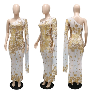 Detailed views of white one-shoulder evening gown with gold sequins and cape sleeve