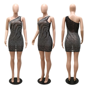 Detailed views of black bodycon one-shoulder mini dress with silver rhinestone wave patterns