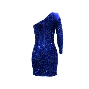 Close-up of blue sequin dress detail with feather shoulder trim and metallic texture