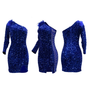 Detail of blue sequin party dress with feather shoulder and side chain cut-outs