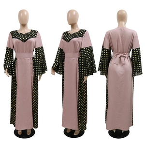 Mauve maxi abaya dress with polka dot flare sleeves and waist tie shown from three angles