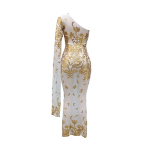 Detail of white one-shoulder evening dress with gold sequins and long draped sleeve