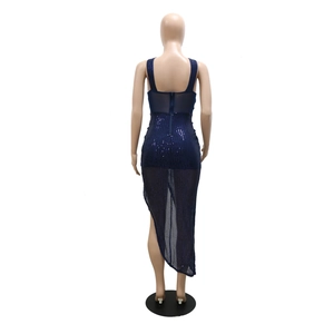 Detail of navy blue sequin dress featuring cross-neck design and asymmetrical tulle hemline
