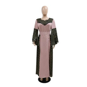 Detail of bell sleeves and polka dot patchwork on dark pink maxi dress for women