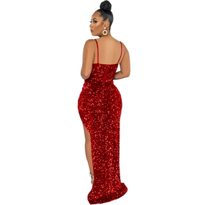 Detail of high-slit red sequin evening dress showing open back and thin straps