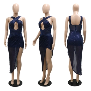 Detail view of navy blue sequin party dress featuring cross neck and mesh cutouts