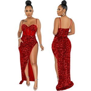 Detailed view showing the red sequin fabric and corset design of the high slit evening gown