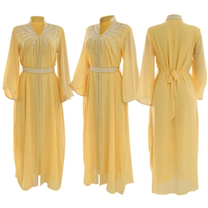 Elegant yellow kaftan abaya with silver beadwork showing front, side and back views