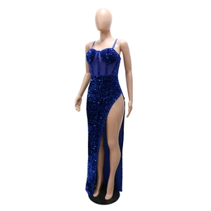 Detail of royal blue sequin dress featuring corset bodice and high side slit
