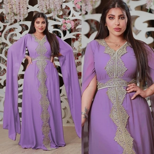 Lavender chiffon evening gown with gold embroidery and floor-length split sleeves