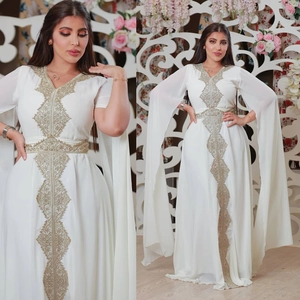Elegant white chiffon evening gown with golden embroidery and cape sleeves for women