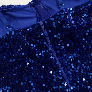 Detailed view of the royal blue sequins and hidden zipper on a slit party dress