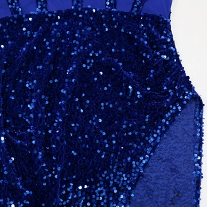 Detail of high-density blue sequins and sheer mesh on a sexy high-slit evening dress