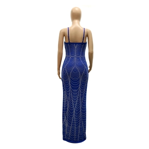 Detailed back view of sexy navy blue backless dress with glittering rhinestone wave patterns