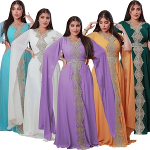 Detail of five colors of embroidered chiffon evening gowns with cape sleeves and gold embroidery