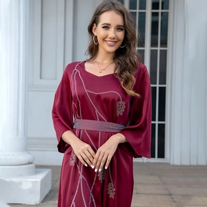 Elegant burgundy V-neck maxi dress with leaf rhinestone pattern and flared sleeves