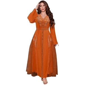 Elegant orange kaftan dress with gold bead embroidery and sheer mesh panels
