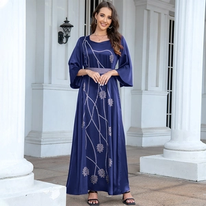 Elegant navy blue maxi dress with silver leaf patterns and sequined waist detailing
